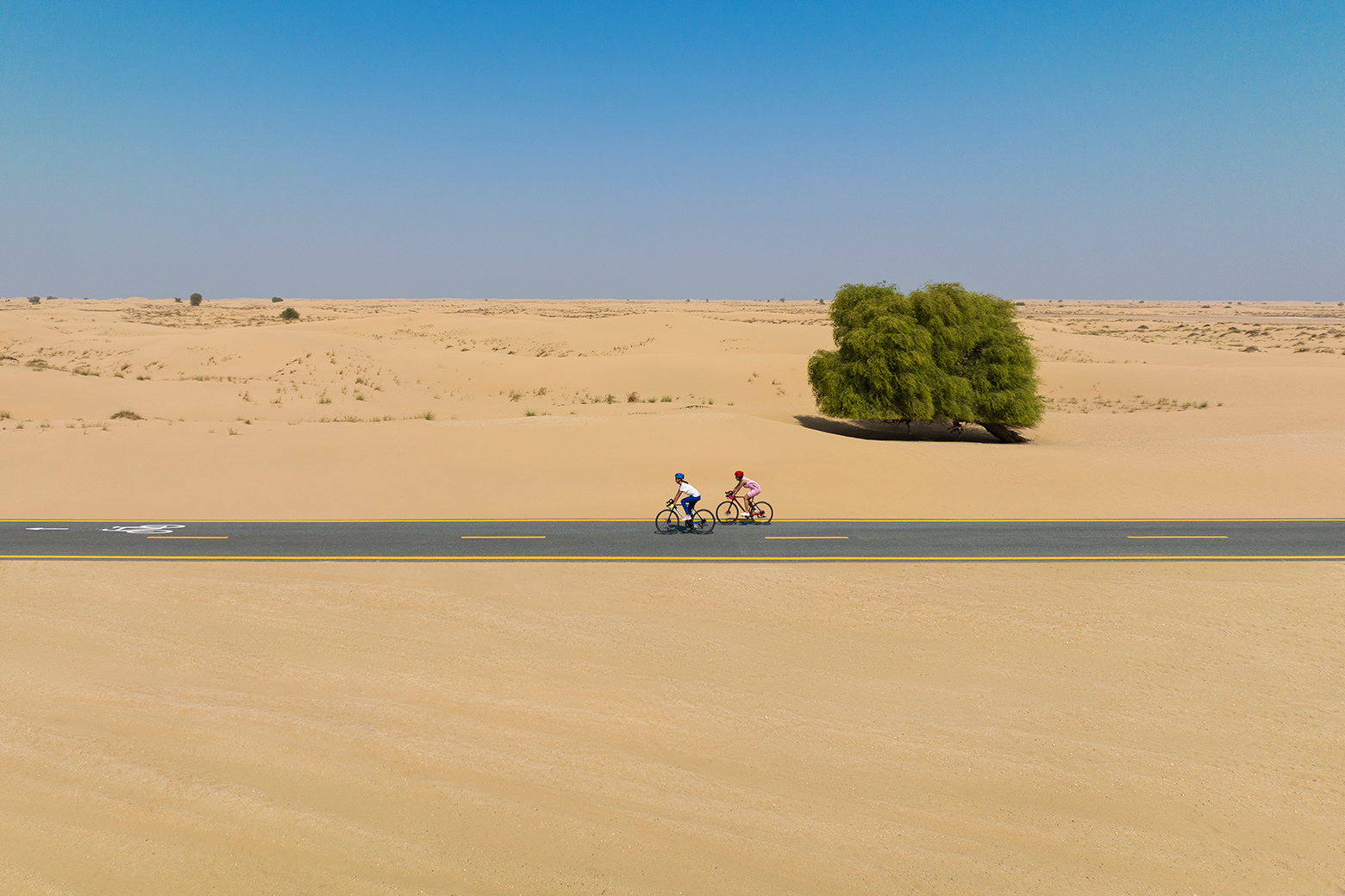 a guide to cycling in dubai al qudra header